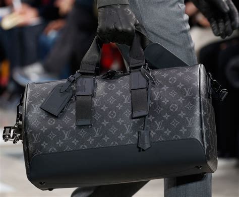 prada or louis vuitton bag|Prada Louis Vuitton.